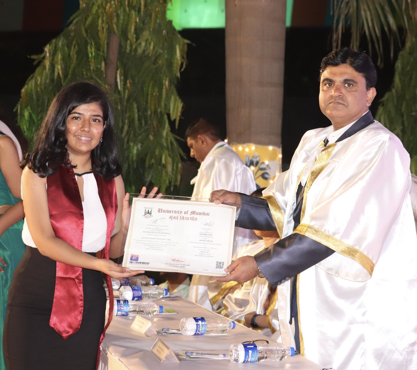 Disha Sawant receiving her University of Mumbai engineering degree